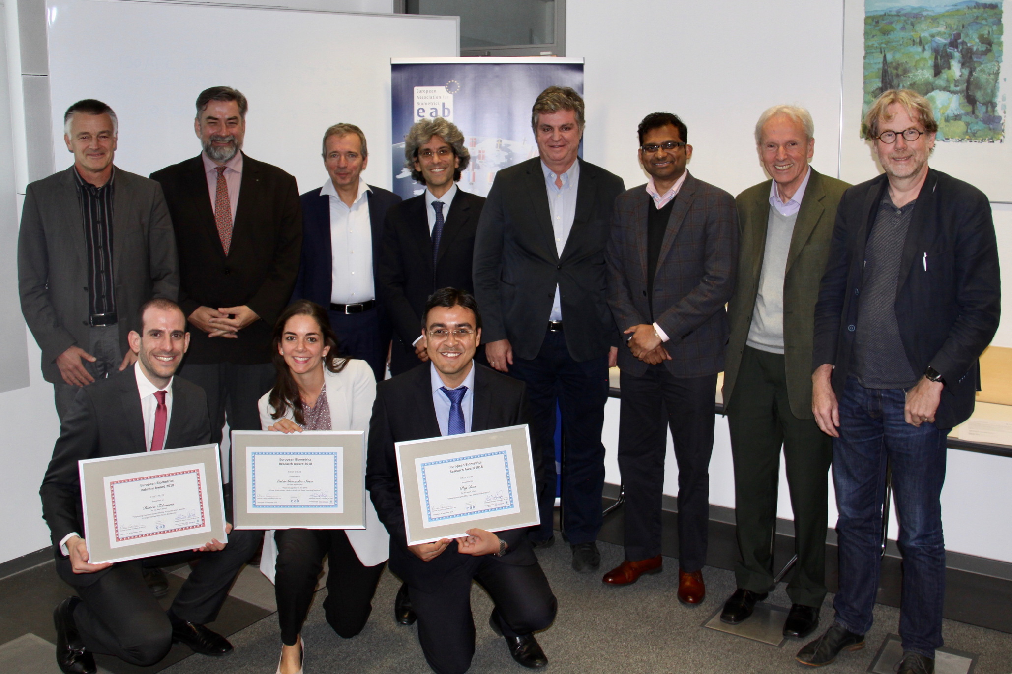 [Photo] The EAB award chair, Prof Patrizio Campisi (Università degli Studi Roma Tre), the award winners Ruben Tolosana, Ester Gonzalez Sosa, Rig Das and the jury members Christoph Busch, Michel Kostucki, Javier Ortega, Arun Ross, Josef Kittler, Raymond Veldhuis together with the EAB chairman Alexander Nouak