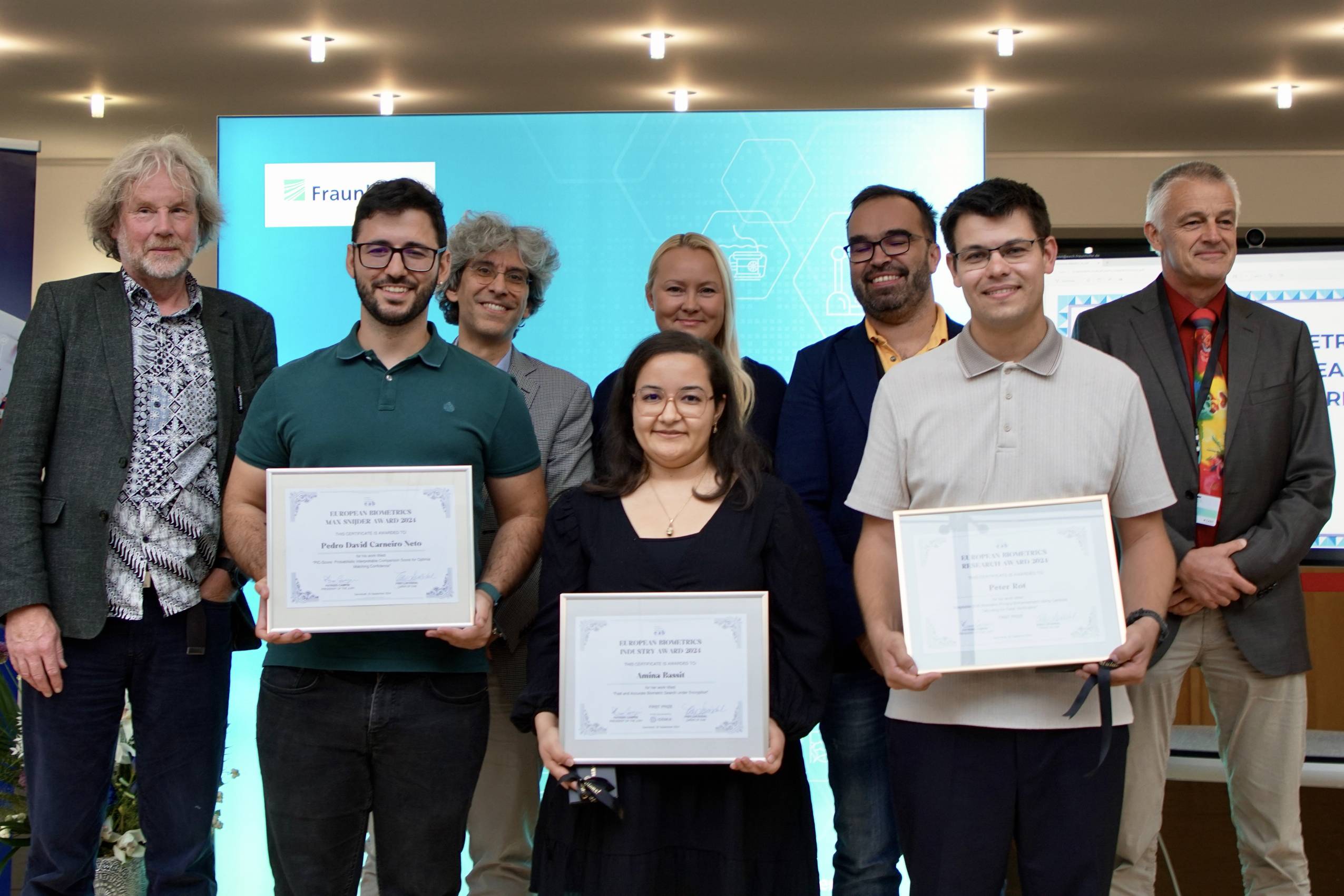 [Photo] The winners of the European Biometrics Awards 2024 alongside members of the jury and the European Association for Biometrics: (f.l.t.r.) Prof. Raymond Veldhuis, Pedro Carneiro Neto, Prof. Patrizio Campisi, Amina Bassit, Fr&oslash;y L&oslash;v&aring;sdal, Prof. Vitomir &Scaron;truc, Peter Rot, and Prof. Christoph Busch